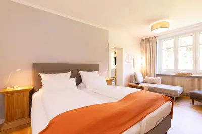 Ein Bett oder Betten in einem Zimmer der Unterkunft Villa Siegfried