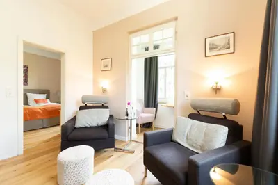 Ein Bett oder Betten in einem Zimmer der Unterkunft Villa Siegfried
