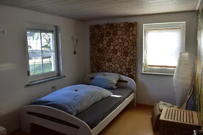 Ein Bett oder Betten in einem Zimmer der Unterkunft Zimmer Bärbel