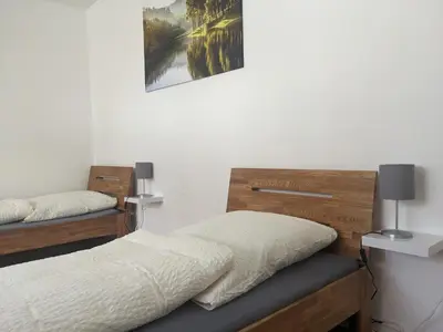 Ein Bett oder Betten in einem Zimmer der Unterkunft Monteurunterkunft Windischeschenbach by HausGruenerBaum