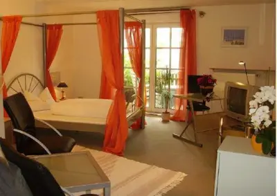 Ein Bett oder Betten in einem Zimmer der Unterkunft Hotel Rossner