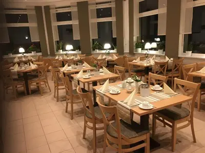 Ein Restaurant oder anderes Speiselokal in der Unterkunft Motel Hormersdorf