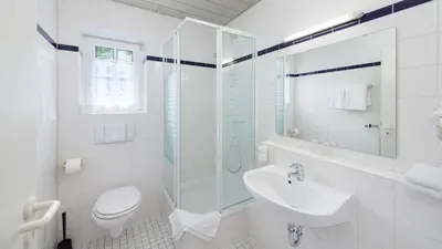 Ein Badezimmer in der Unterkunft Motel Hormersdorf