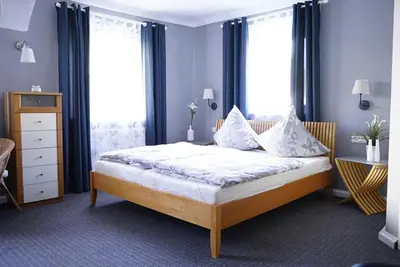 Ein Bett oder Betten in einem Zimmer der Unterkunft Nordlicht Hollfeld