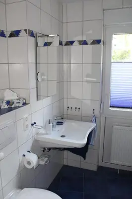 Ein Badezimmer in der Unterkunft Spitzen-Ferienwohnung in der Spitzenstadt Plauen