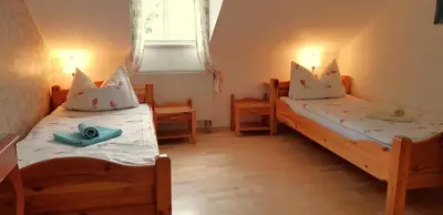 Ein Bett oder Betten in einem Zimmer der Unterkunft Villa Hoffnung