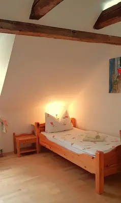 Ein Bett oder Betten in einem Zimmer der Unterkunft Villa Hoffnung