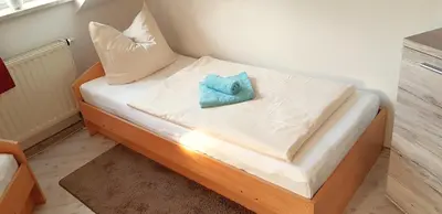 Ein Bett oder Betten in einem Zimmer der Unterkunft Villa Hoffnung