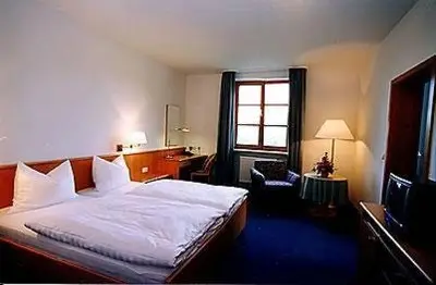 Ein Bett oder Betten in einem Zimmer der Unterkunft Gasthof Hotel Rückerl
