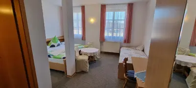 Ein Bett oder Betten in einem Zimmer der Unterkunft Gasthof Landhaus Adorf