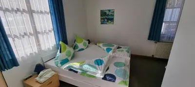 Ein Bett oder Betten in einem Zimmer der Unterkunft Gasthof Landhaus Adorf