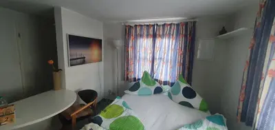 Ein Bett oder Betten in einem Zimmer der Unterkunft Miniferienhaus Bad Elster