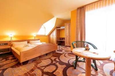 Ein Bett oder Betten in einem Zimmer der Unterkunft Flößerstube