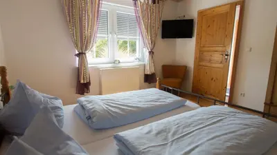 Ein Bett oder Betten in einem Zimmer der Unterkunft Ferienwohnung Schultheiss