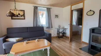 Ein Sitzbereich in der Unterkunft Ferienwohnung Schultheiss