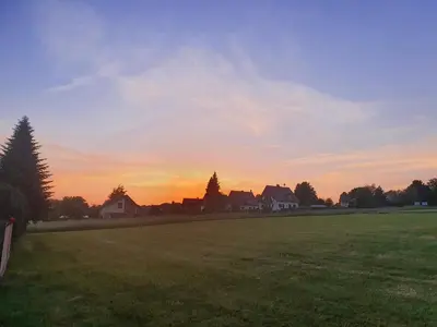 Blick auf den Sonnenuntergang/Sonnenaufgang von der Ferienwohnung aus oder aus der Nähe