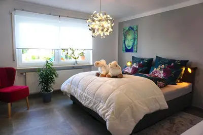 Ein Bett oder Betten in einem Zimmer der Unterkunft Ferienwohnung Schott