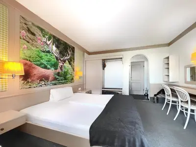 Ein Bett oder Betten in einem Zimmer der Unterkunft WAGNERS Hotel Schönblick, C&C Hotels und Vertrieb GmbH