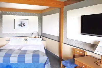 Ein Bett oder Betten in einem Zimmer der Unterkunft WAGNERS Hotel Schönblick, C&C Hotels und Vertrieb GmbH