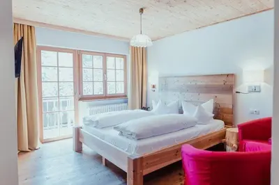 Ein Bett oder Betten in einem Zimmer der Unterkunft Hotel Am Fichtelsee