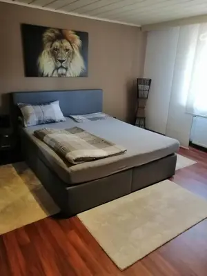 Ein Bett oder Betten in einem Zimmer der Unterkunft Ferienwohnung Neuhaus