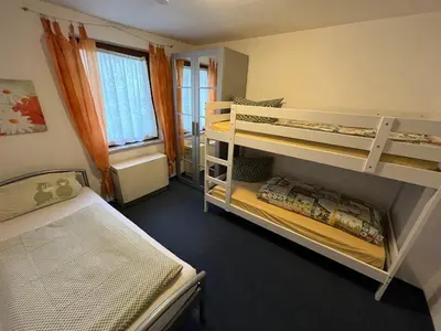 Ein Bett oder Betten in einem Zimmer der Unterkunft Ferienwohnung Schlossberg 2