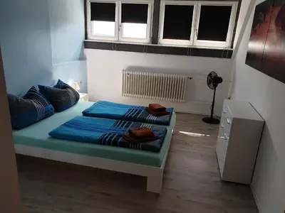 Ein Bett oder Betten in einem Zimmer der Unterkunft Großzügige Ferienwohnung in Furth im Wald