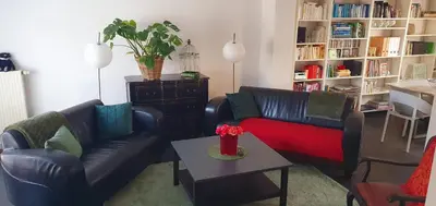 Ein Sitzbereich in der Unterkunft Ferienhaus Rosengarten