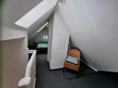 Ein Bett oder Betten in einem Zimmer der Unterkunft Ferienhaus Rosengarten