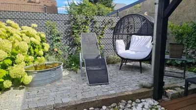 Ein Garten an der Unterkunft Ferienhaus Rosengarten