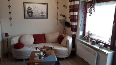 Ein Sitzbereich in der Unterkunft Haus Monika