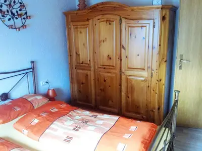 Ein Bett oder Betten in einem Zimmer der Unterkunft Haus Monika