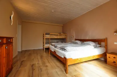 Ein Bett oder Betten in einem Zimmer der Unterkunft Ferienwohnung Steinberg