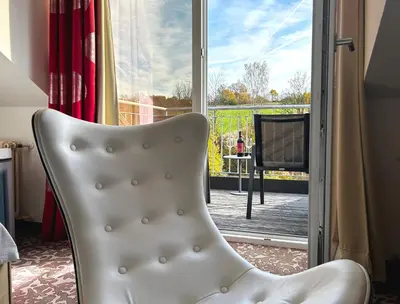 Ein Sitzbereich in der Unterkunft Hotel Wutzschleife