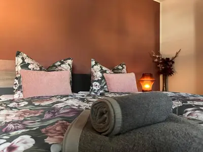 Ein Bett oder Betten in einem Zimmer der Unterkunft KIWE5