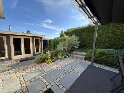 Ein Garten an der Unterkunft KIWE5