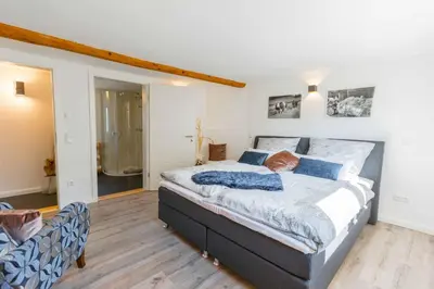 Ein Bett oder Betten in einem Zimmer der Unterkunft Ferienschmiede Frankenwald