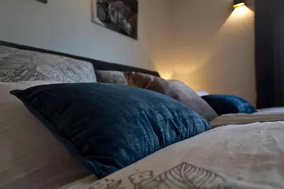 Ein Bett oder Betten in einem Zimmer der Unterkunft Ferienschmiede Frankenwald