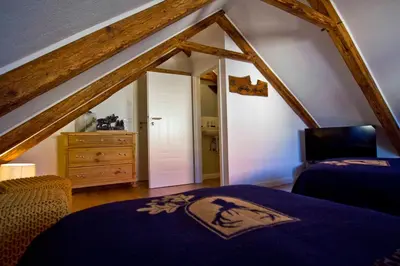 Ein Bett oder Betten in einem Zimmer der Unterkunft Ferienschmiede Frankenwald