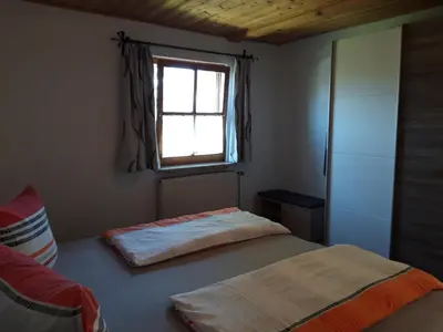 Ein Bett oder Betten in einem Zimmer der Unterkunft Ferienhaus Heuberger