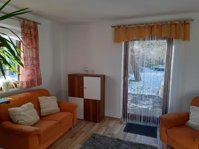 Ein Sitzbereich in der Unterkunft Ferienhaus Waldblick