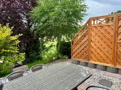 Ein Garten an der Unterkunft Pumphuts Scheune Ferienwohnungen Nr 5 - 9 beim Freizeitpark Plohn