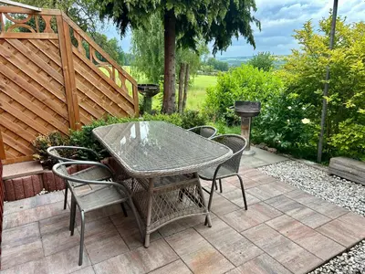 Ein Garten an der Unterkunft Pumphuts Scheune Ferienwohnungen Nr 5 - 9 beim Freizeitpark Plohn