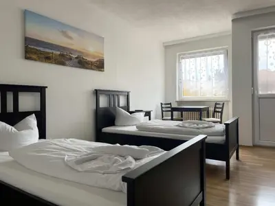 Ein Bett oder Betten in einem Zimmer der Unterkunft SAD161 - Gut geschnittene Monteurwohnung mit Balkon
