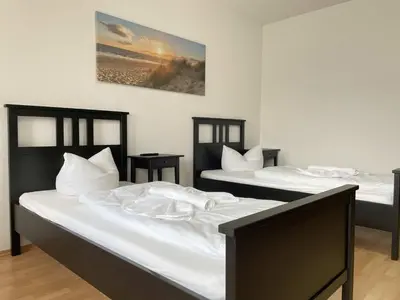 Ein Bett oder Betten in einem Zimmer der Unterkunft SAD161 - Gut geschnittene Monteurwohnung mit Balkon