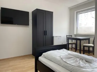 Ein Bett oder Betten in einem Zimmer der Unterkunft SAD161 - Gut geschnittene Monteurwohnung mit Balkon