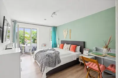 Ein Bett oder Betten in einem Zimmer der Unterkunft Salí Homes - LM1 cozy studio in Bayreuth with ideal access to A9