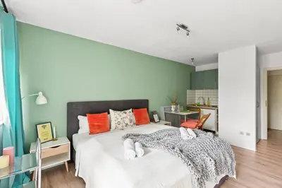 Ein Bett oder Betten in einem Zimmer der Unterkunft Salí Homes - LM1 cozy studio in Bayreuth with ideal access to A9
