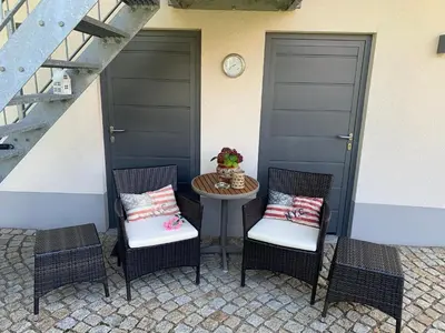 Ein Balkon oder eine Terrasse in der Unterkunft Bezaubernde Ferienwohnung mit Rosengarten