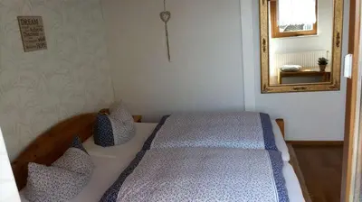 Ein Bett oder Betten in einem Zimmer der Unterkunft Klein aber fein - Apartment für 2 bis 4 Personen
